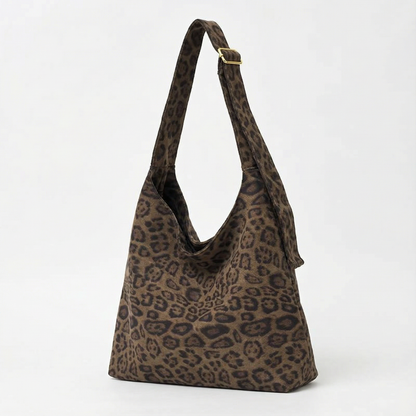 The Plot-Pivot Suede Carryall: The Only Baggage You’ll Actually Enjoy Carrying