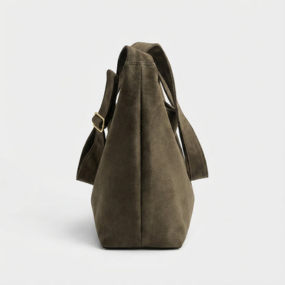 The Plot-Pivot Suede Carryall: The Only Baggage You’ll Actually Enjoy Carrying