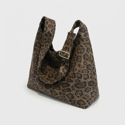 The Plot-Pivot Suede Carryall: The Only Baggage You’ll Actually Enjoy Carrying