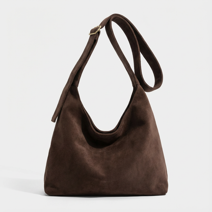 The Plot-Pivot Suede Carryall: The Only Baggage You’ll Actually Enjoy Carrying